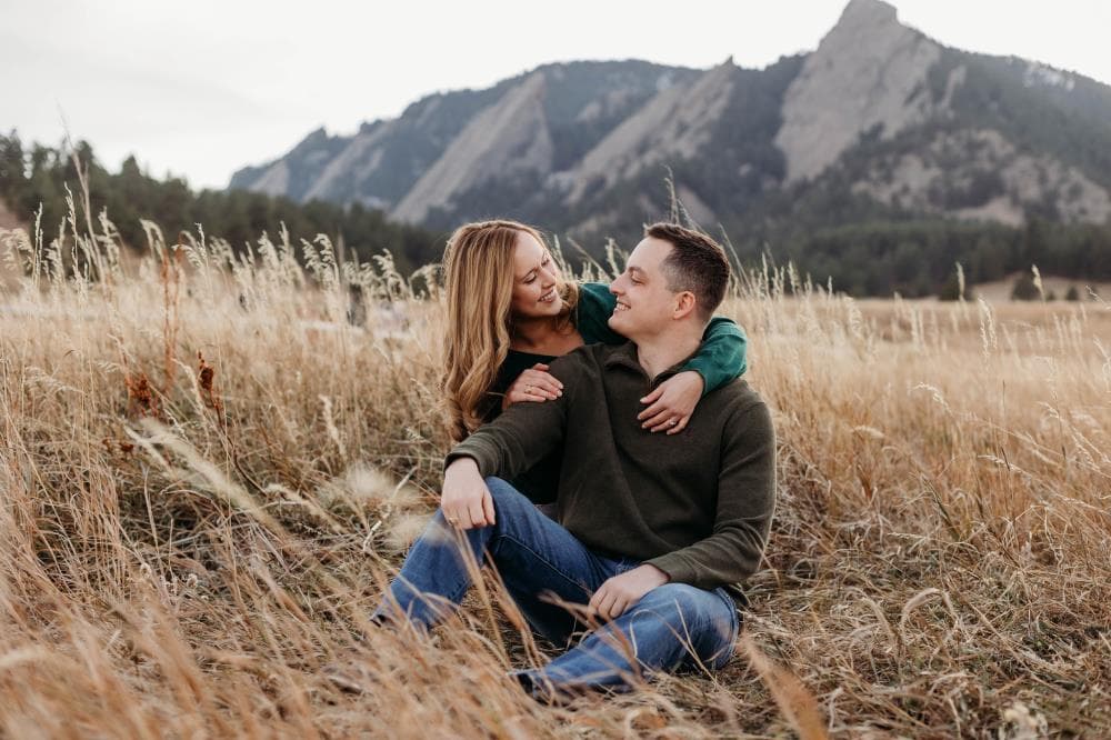 Engaged couple holding hands outdoor portrait Fort Collins Colorado