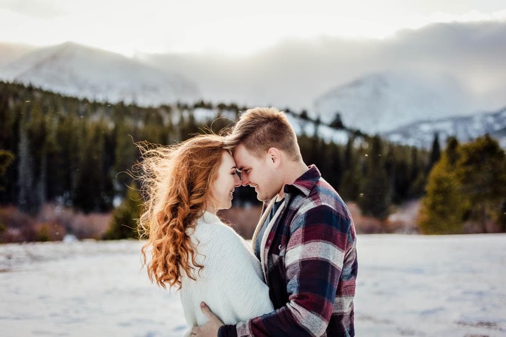 Engaged couple holding hands outdoor portrait Fort Collins Colorado
