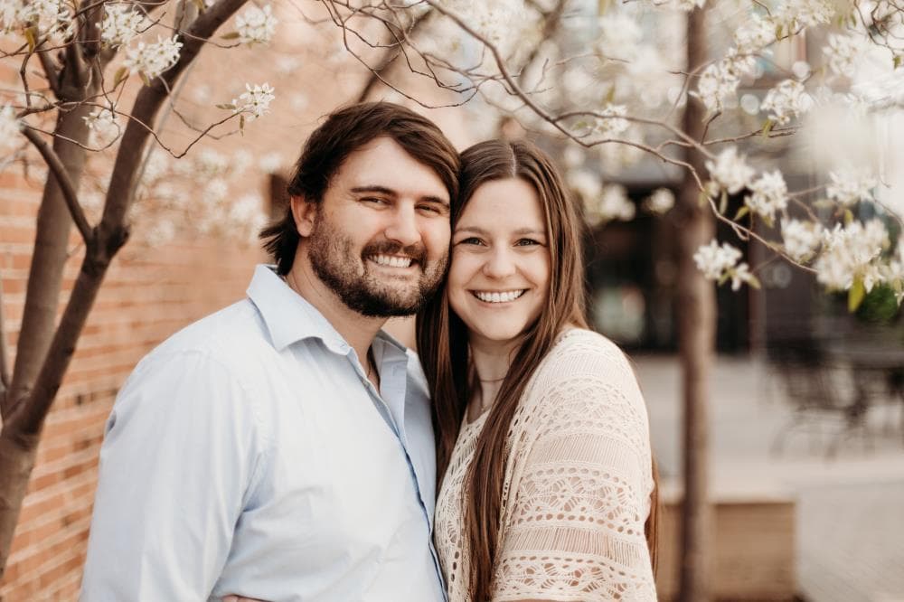 Engaged couple holding hands outdoor portrait Fort Collins Colorado