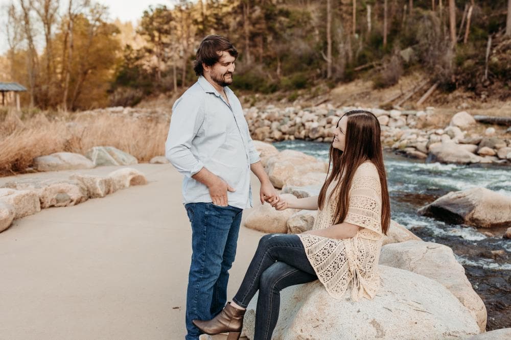 Engaged couple holding hands outdoor portrait Fort Collins Colorado