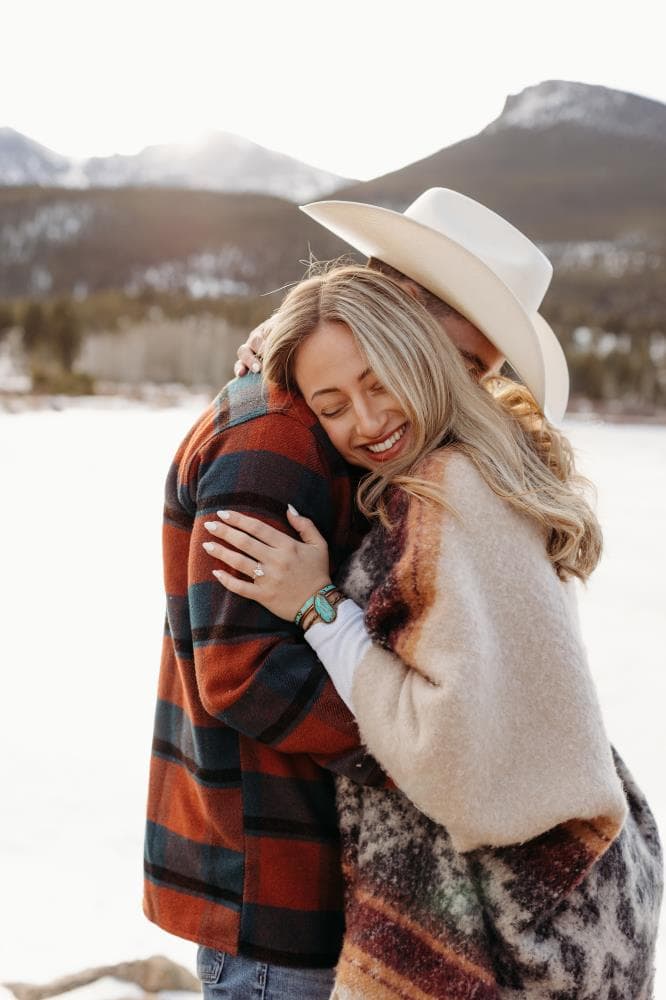 Engaged couple holding hands outdoor portrait Fort Collins Colorado