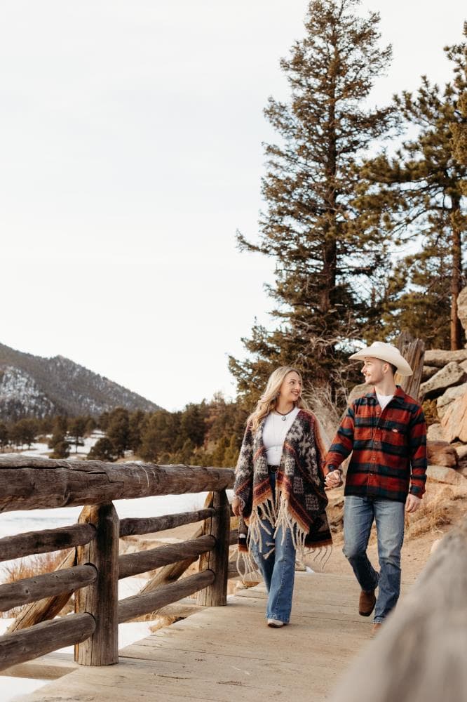 Couple embracing at sunset engagement photos Front Range Colorado