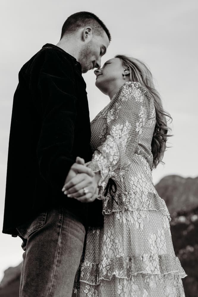 Couple embracing at sunset engagement photos Front Range Colorado
