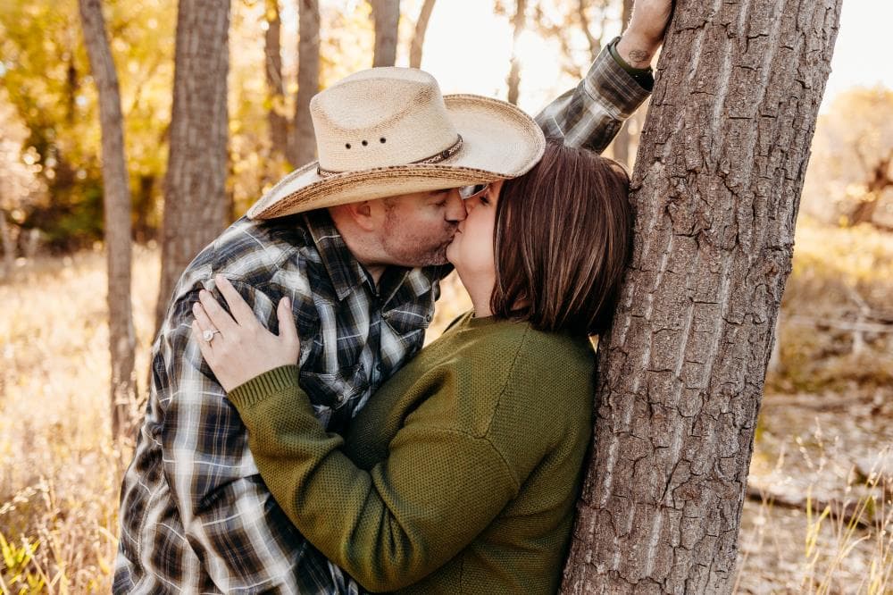 Engaged couple holding hands outdoor portrait Fort Collins Colorado