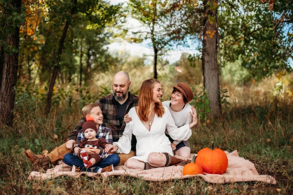 Kids running in field family session Severance Colorado