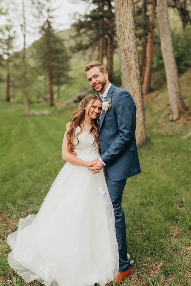 Bride walking down aisle surrounded by guests Northern Colorado wedding
